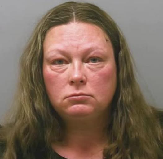 Sandy Michael Williams 45 years old, shoots husband after telling him she would kill him if he laid a hand on her