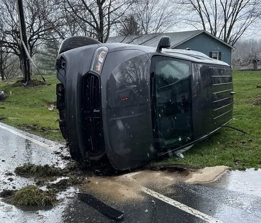 Rollover Accident on Woodville Road: Adults and Child Evaluated at Scene